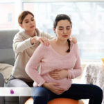 A pregnant woman with a doula